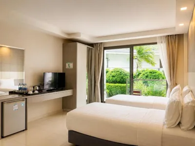 Twin Room met uitzicht op de tuin — Sunset Beach Hotel - Adults Only